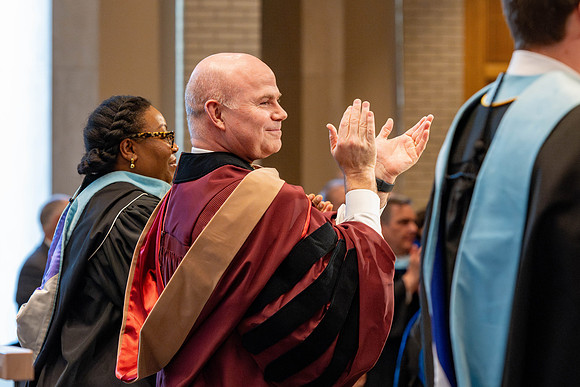 Students graduate from the College of Language and Letters, in the Taylor Building.