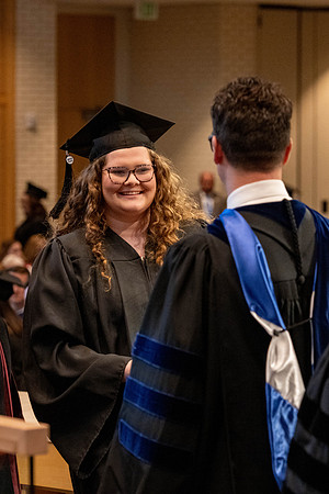 Students graduate from the College of Language and Letters, in the Taylor Building.