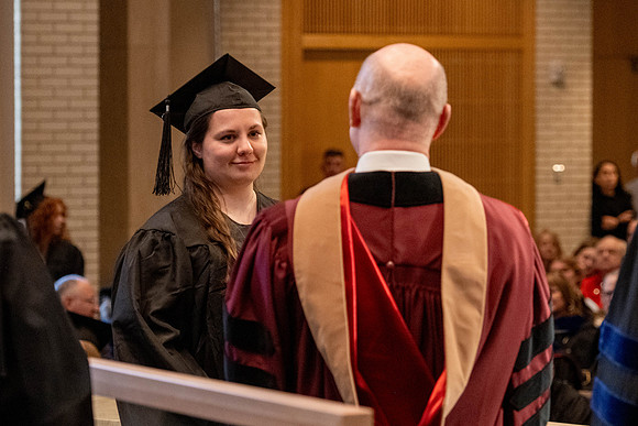 Students graduate from the College of Language and Letters, in the Taylor Building.