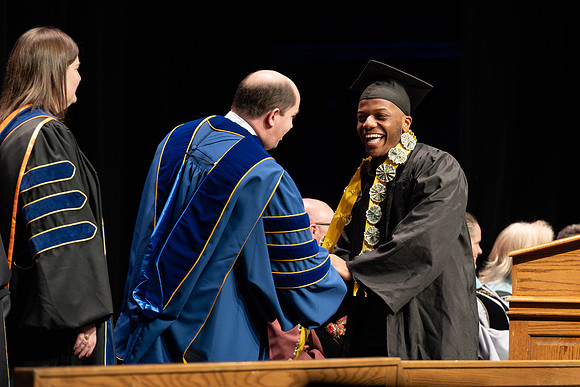 Students graduate from the College of Physical Sciences & Engineering, in the Hart Building.