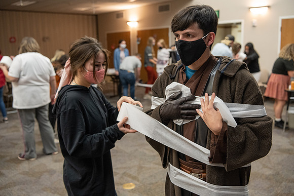 Students participate in a Halloween party as part of the special needs program