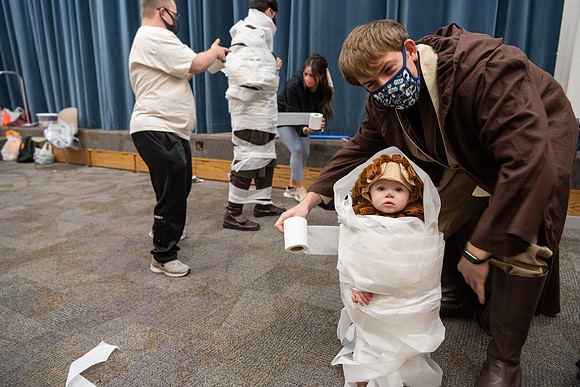 Students participate in a Halloween party as part of the special needs program