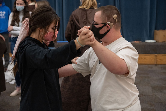 Students participate in a Halloween party as part of the special needs program
