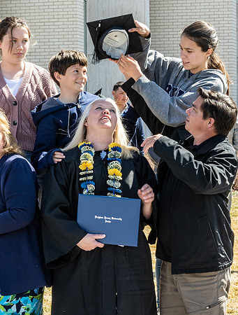 Graduates outside the Taylor Building