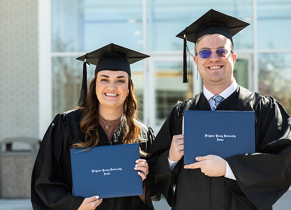 Graduates outside the Taylor Building