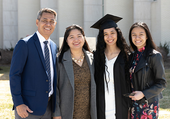 Graduates outside the Taylor Building