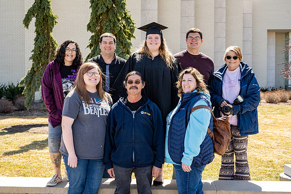 Graduates outside the Taylor Building