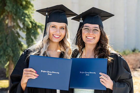 Graduates outside the Taylor Building