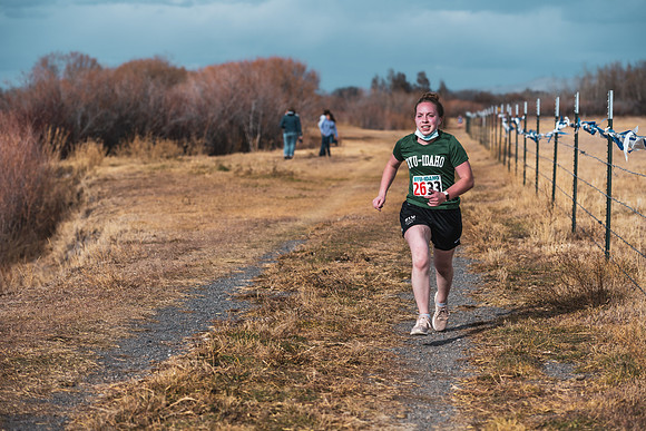 Students compete in the Competitive Sports Cross Country championship on a course at the BYU-Idaho Livestock Center.