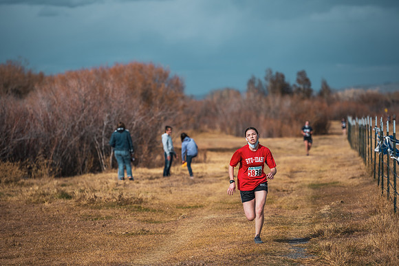 Students compete in the Competitive Sports Cross Country championship on a course at the BYU-Idaho Livestock Center.
