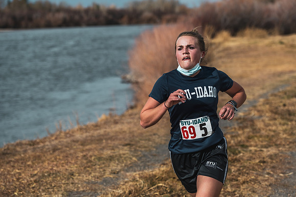Students compete in the Competitive Sports Cross Country championship on a course at the BYU-Idaho Livestock Center.