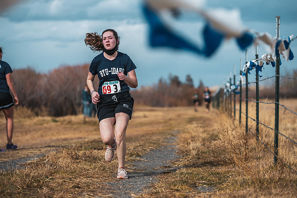 Students compete in the Competitive Sports Cross Country championship on a course at the BYU-Idaho Livestock Center.
