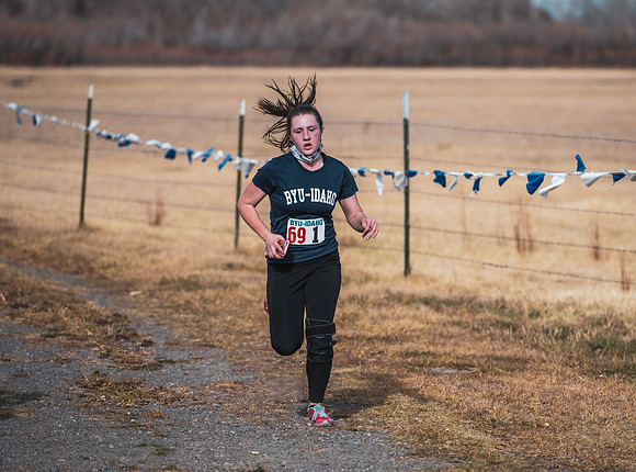 Students compete in the Competitive Sports Cross Country championship on a course at the BYU-Idaho Livestock Center.