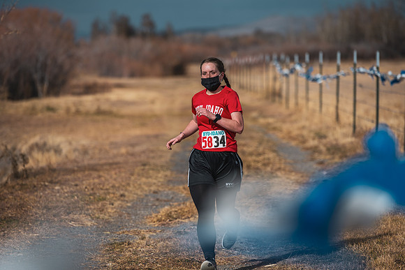 Students compete in the Competitive Sports Cross Country championship on a course at the BYU-Idaho Livestock Center.