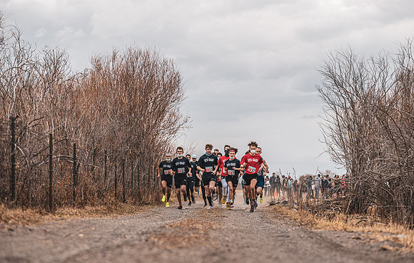 Students compete in the Competitive Sports Cross Country championship on a course at the BYU-Idaho Livestock Center.