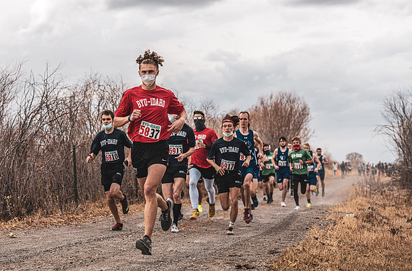 Students compete in the Competitive Sports Cross Country championship on a course at the BYU-Idaho Livestock Center.
