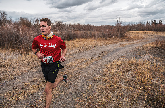 Students compete in the Competitive Sports Cross Country championship on a course at the BYU-Idaho Livestock Center.