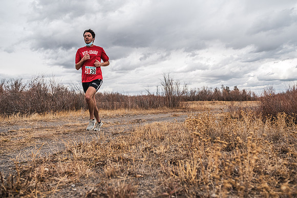 Students compete in the Competitive Sports Cross Country championship on a course at the BYU-Idaho Livestock Center.