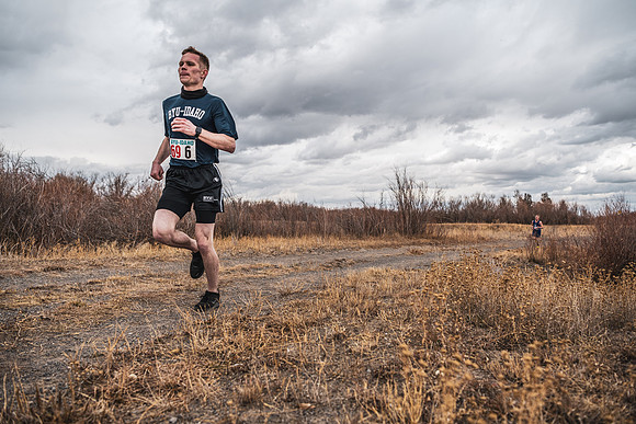 Students compete in the Competitive Sports Cross Country championship on a course at the BYU-Idaho Livestock Center.