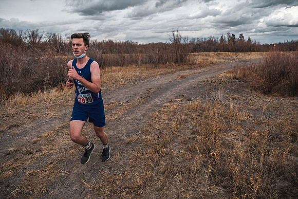 Students compete in the Competitive Sports Cross Country championship on a course at the BYU-Idaho Livestock Center.