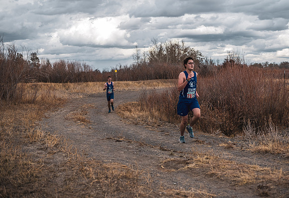 Students compete in the Competitive Sports Cross Country championship on a course at the BYU-Idaho Livestock Center.