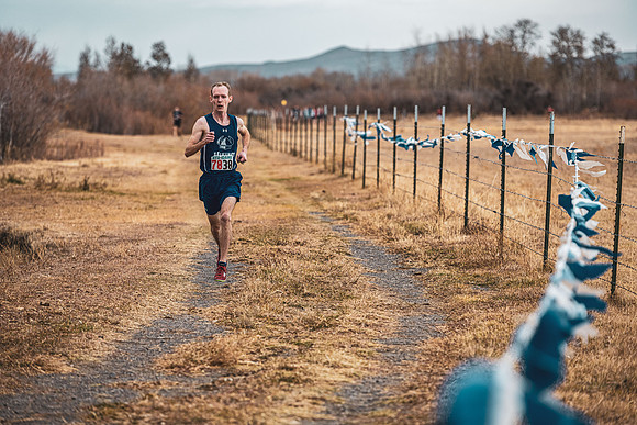 Students compete in the Competitive Sports Cross Country championship on a course at the BYU-Idaho Livestock Center.