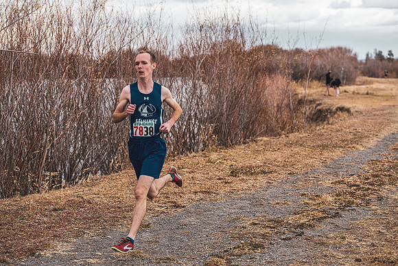 Students compete in the Competitive Sports Cross Country championship on a course at the BYU-Idaho Livestock Center.
