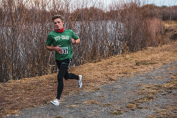 Students compete in the Competitive Sports Cross Country championship on a course at the BYU-Idaho Livestock Center.