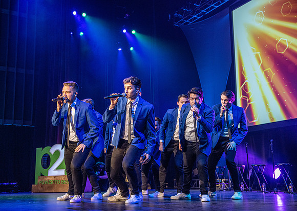 Vocal Point performs during Power to Become, held in the Hart Auditorium.