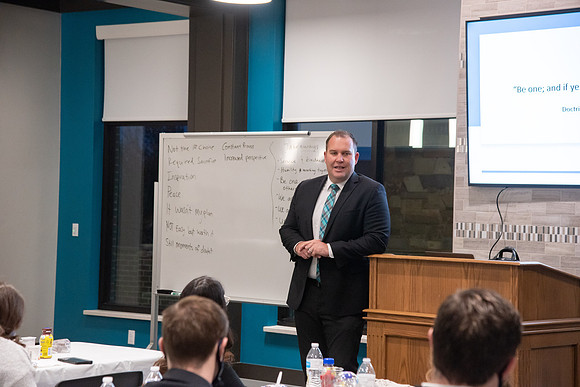 Guest speaker, Riley Burton, at the Housing and Student Living Morningside at the new community center at University Village.