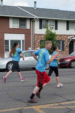 Teton Dam Marathon participants run towards the finish line at Smith Park in Rexburg, Idaho.
