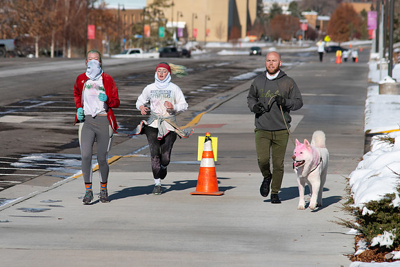 Students and their families running the Holiday Color Run.