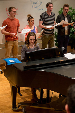 Students sing under the direction of Brother Randall Kempton in the Collegiate Singers ensemble.