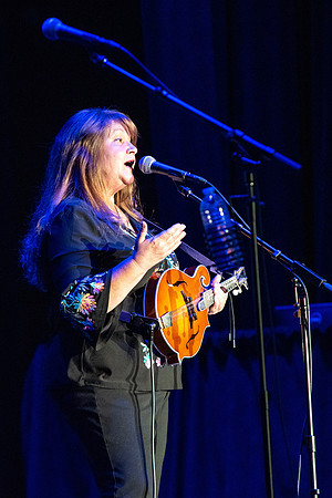 Jim Curry performs songs of John Denver at the Hart Auditorium.