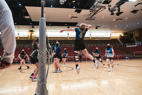 The women's volleyball championship took place in the Hart gym with COVID-19 safety precautions in place.