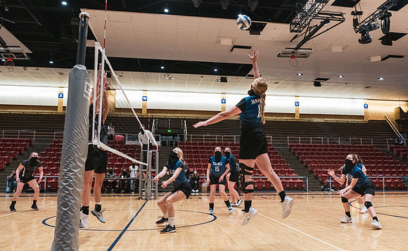 The women's volleyball championship took place in the Hart gym with COVID-19 safety precautions in place.