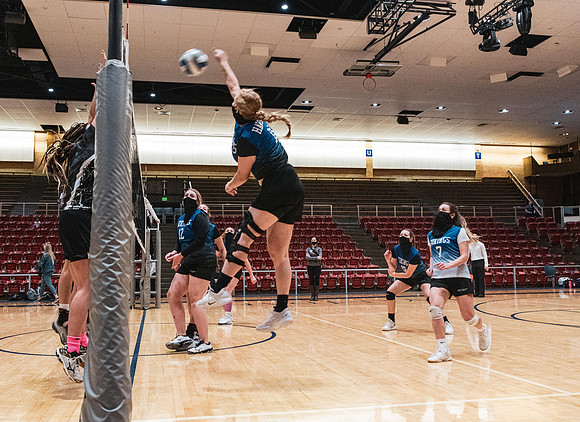The women's volleyball championship took place in the Hart gym with COVID-19 safety precautions in place.