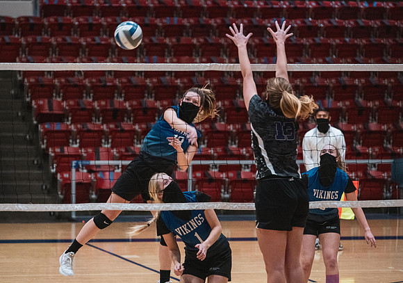 The women's volleyball championship took place in the Hart gym with COVID-19 safety precautions in place.