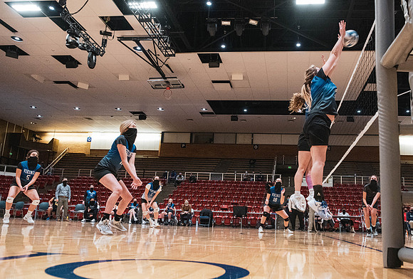 The women's volleyball championship took place in the Hart gym with COVID-19 safety precautions in place.