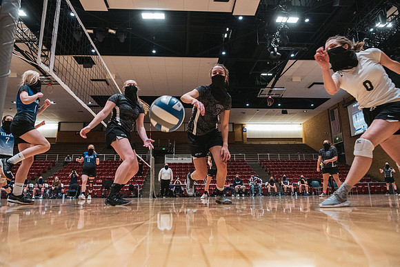 The women's volleyball championship took place in the Hart gym with COVID-19 safety precautions in place.