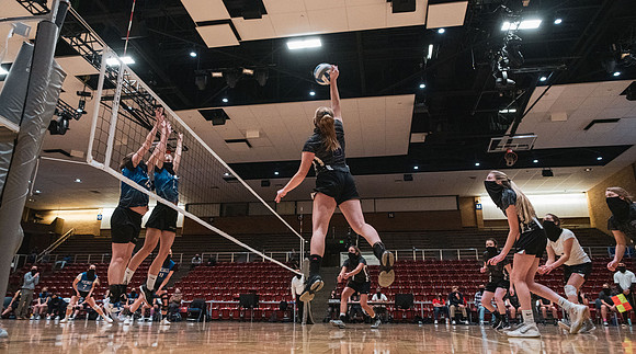 The women's volleyball championship took place in the Hart gym with COVID-19 safety precautions in place.