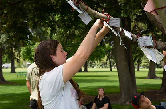 The elementary literacy practicum class put together a wishing tree activity for their elementary students. The class was reading the book "Wish Tree" with their students and decided to make their own