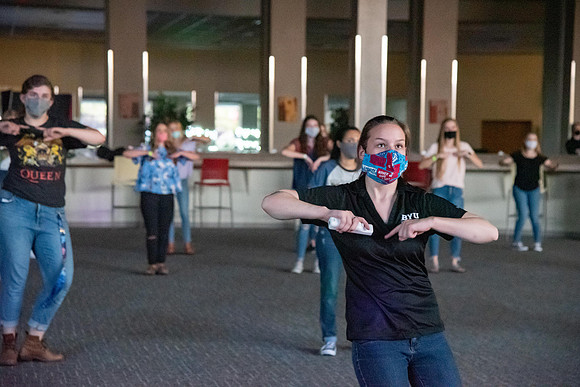 Students enjoy activities while wearing face masks to kick off the fall semester.