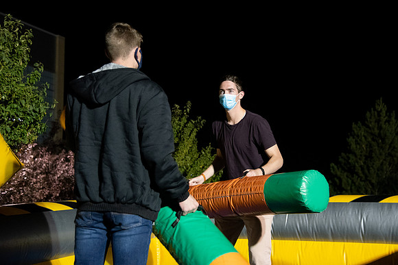 Students enjoy activities while wearing face masks to kick off the fall semester.