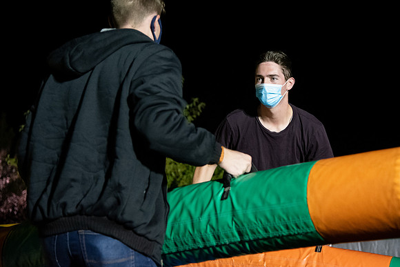 Students enjoy activities while wearing face masks to kick off the fall semester.