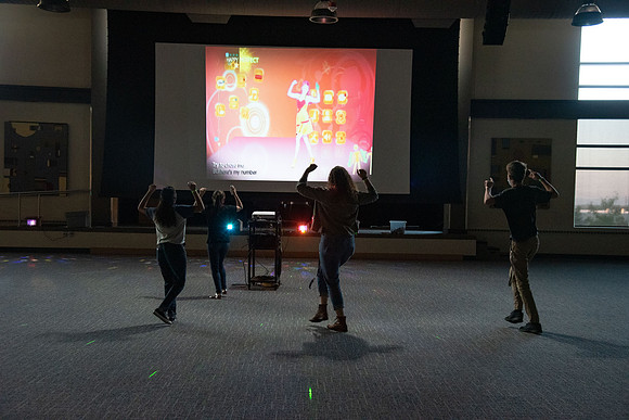 Students enjoy activities while wearing face masks to kick off the fall semester.
