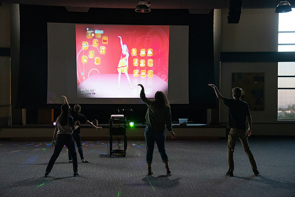 Students enjoy activities while wearing face masks to kick off the fall semester.