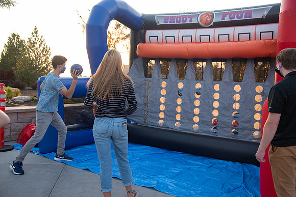 Students enjoy activities while wearing face masks to kick off the fall semester.