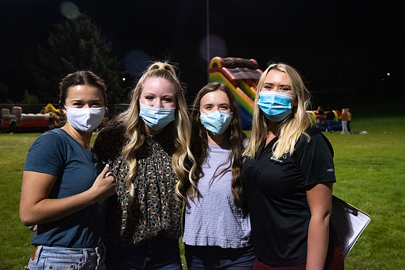 Students enjoy activities while wearing face masks to kick off the fall semester.