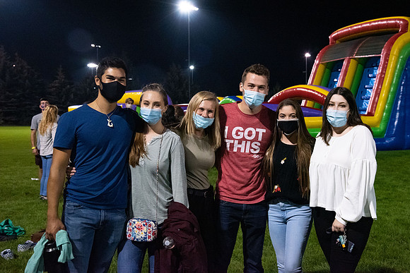 Students enjoy activities while wearing face masks to kick off the fall semester.